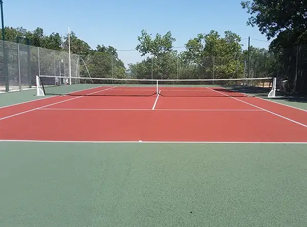 Rénovation court de tennis béton poreux